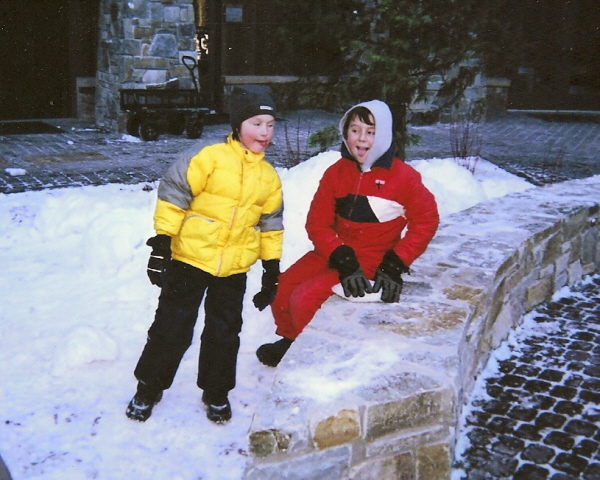 My grandsons making funny faces in the snow.  Calum is 7 and Connor is 9.